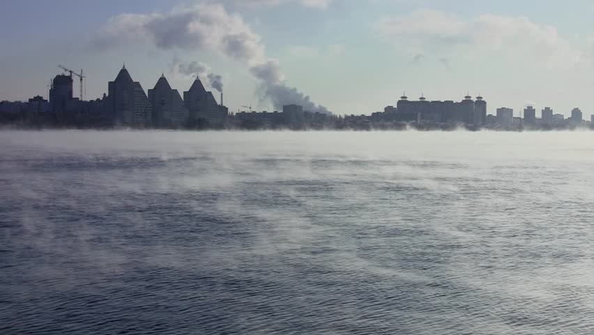 winter reservoir and cityscape