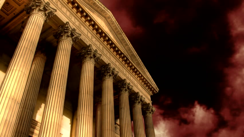 Fireworks explode over classical building