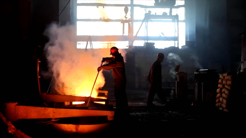 Putting iron in the furnace to melt