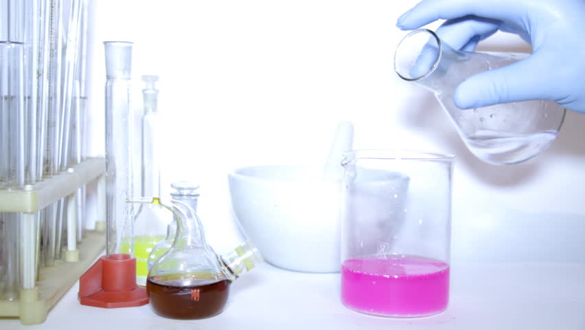 Mad professor conducts strange experiments with different chemical material.