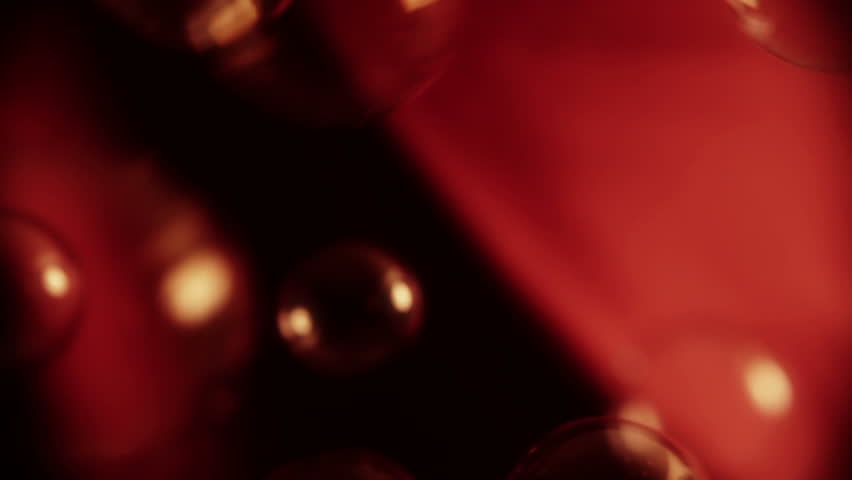 Red silk with soap bubbles