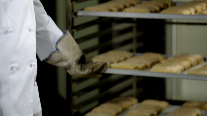 Portrait of a female baker at work; HD Photo JPEG