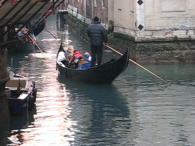 Venice: Gondola passage along an unknown canal