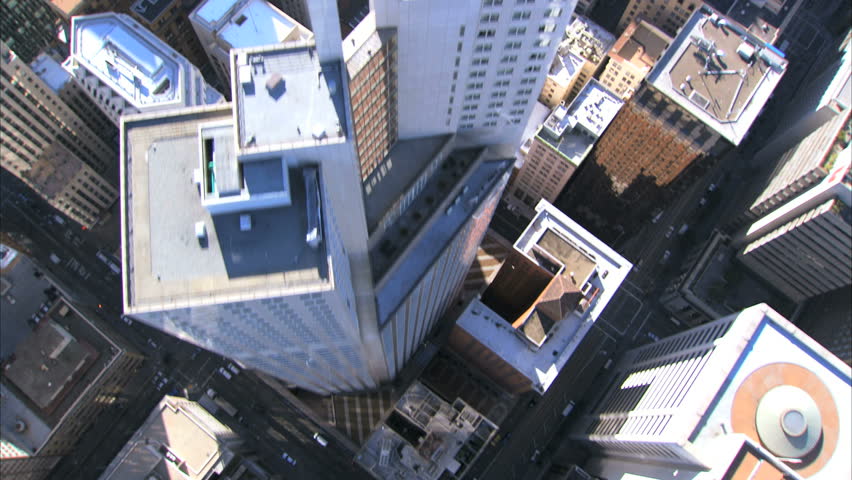 Montage of city aerial views & transport used by business people for travel