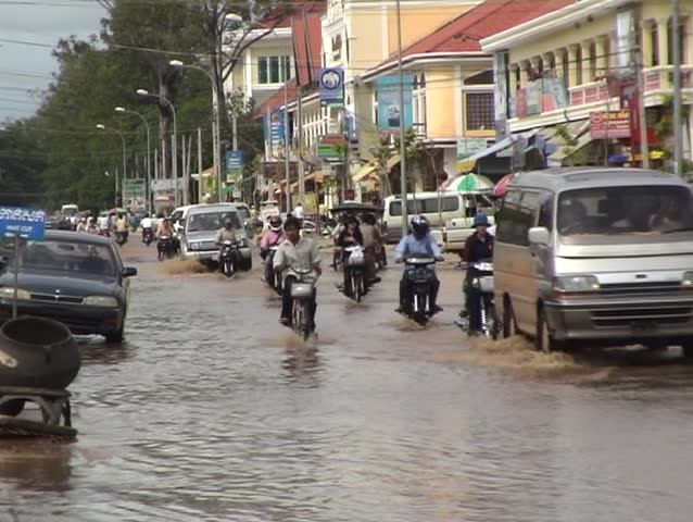 the main street of Siem Reap, Cambodia during the monsoon.
