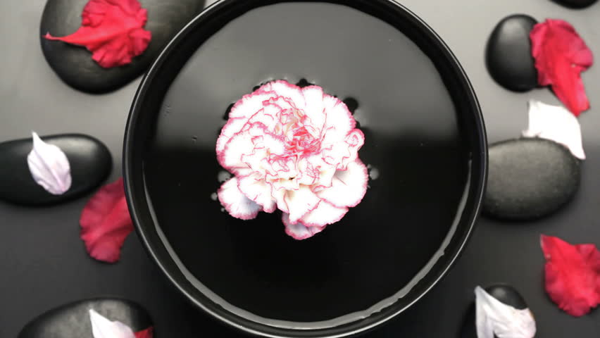 Flower floating and turning on the water in a Spa center
