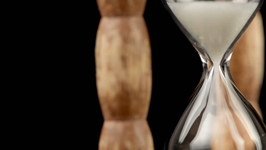 hourglass time with grains running out