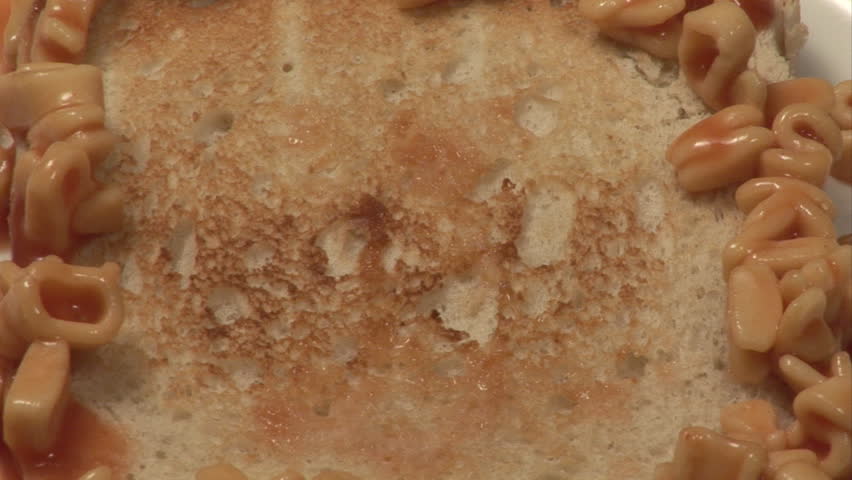 Yummy - spelled out in alphabet soup letters on toast