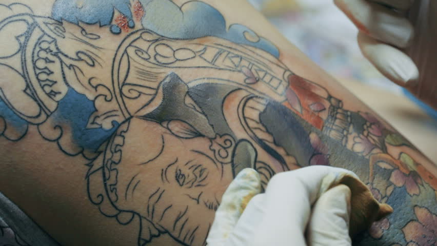 tattoo artist make tattoo at the studio close up stock footage tattoo artist make tattoo at the studio close up stock footage