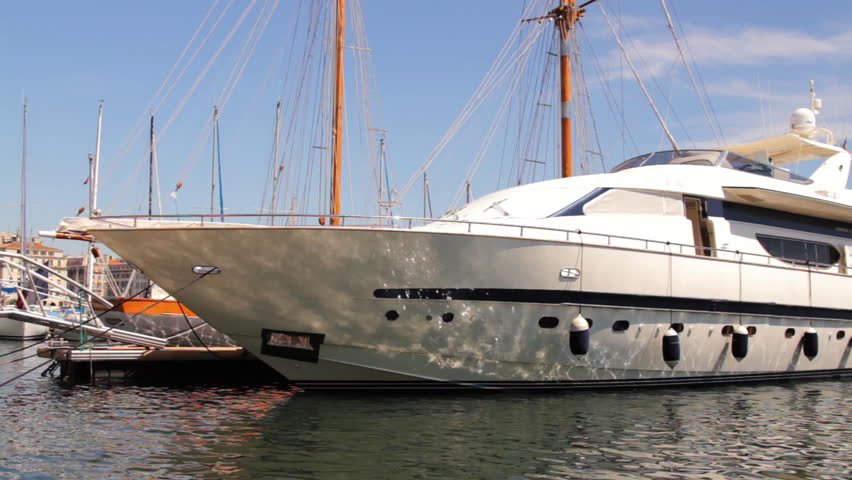 a large luxury yacht in marseille's vieux port harbour, france