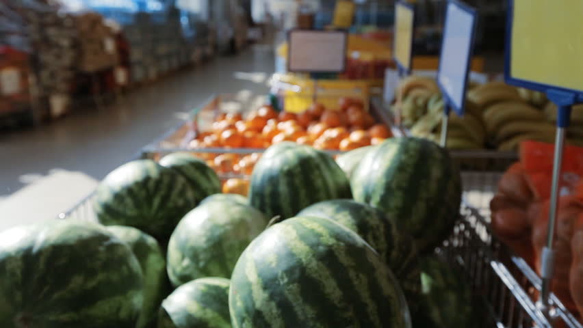 Fruits and vegetables in the supermarket. Watermelons