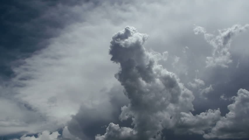 Time Lapse, Twisted cloud shapes break apart, overcome by storm clouds during monsoon season. 1080p