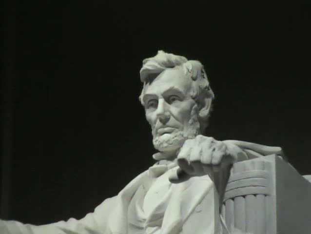 Statue of Abraham lincoln in Lincoln Memorial Washington DC at night 