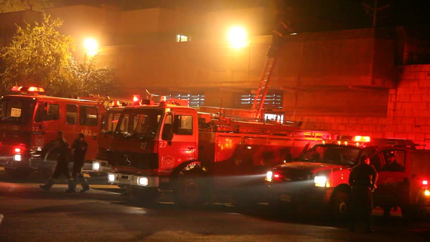 TIRAH, ISRAEL - DECEMBER 2: Fire trucks at work during Mount Carmel fire, December 2, 2010, Tirah, Israel. The 2010 Mount Carmel forest fire began at 11:00 local time on December 2, 2010 and caused severe property and ecological damage. 