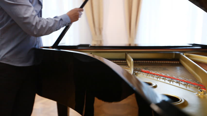 Musician opens up the piano