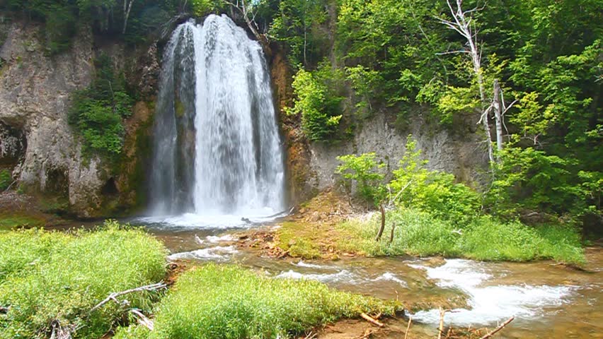 Spearfish Falls flows through the Black Hills National Forest of South Dakota