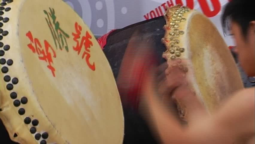Chinese drummer plays at Youth Olympic games 2010 Results day 