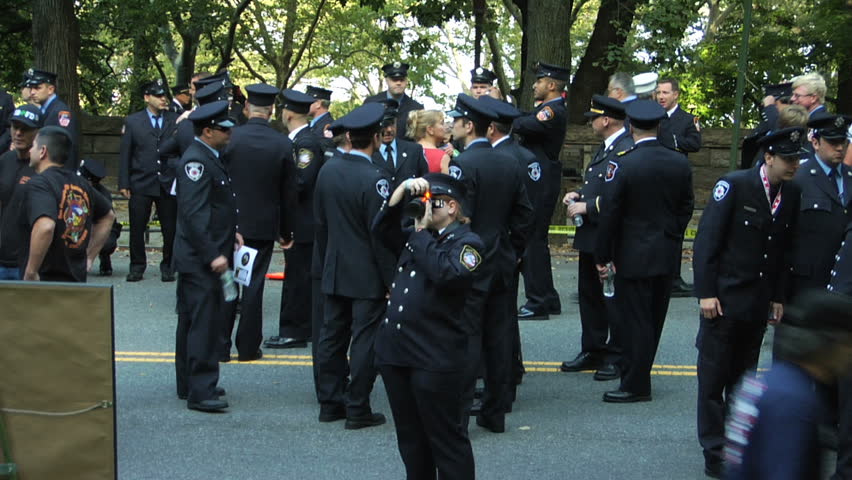NEW YORK - SEPT 11: Firefighters attend a ceremony at the Firefighters Memorial on September 11, 2011 in New York. Firefighters from around the world attended on the 10TH anniversary of 9/11.