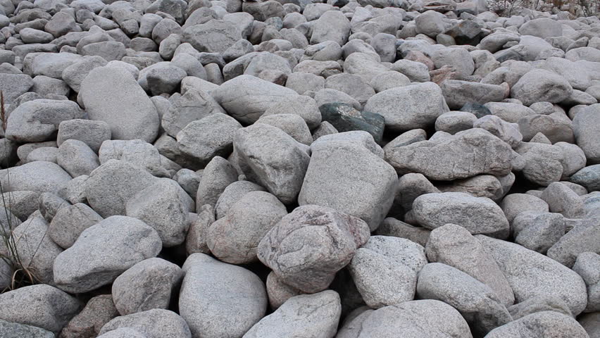 Stones on mountains declivity.
