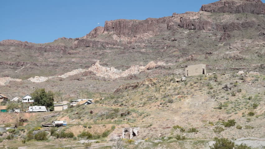 Pan to very old adobe buildings