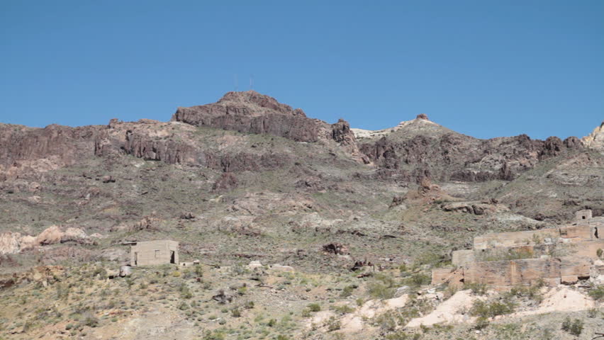 Pan to very old adobe buildings