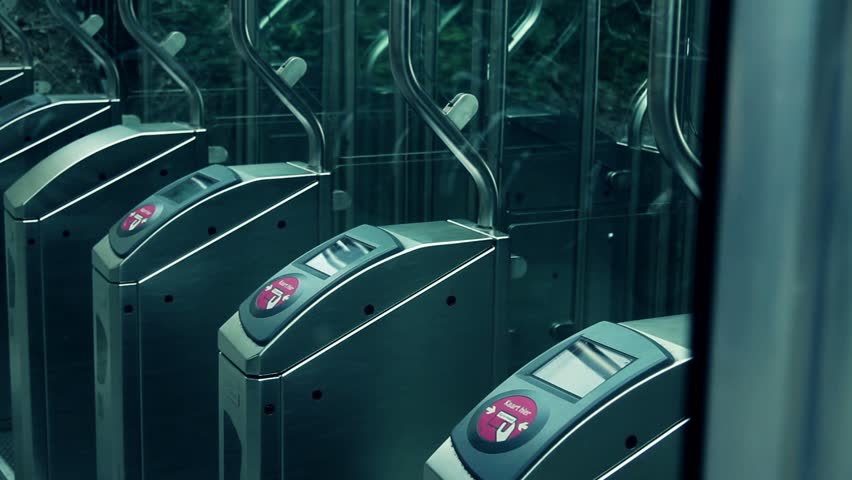 Commuter touching transport card on reader