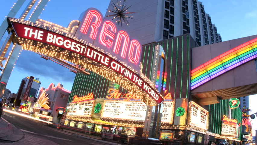RENO, NV - CIRCA 2010: (Timelapse View) traffic passing under a welcome sign for Reno, Nevada, the Biggest Little City in the World's circa 2010 in Reno, NV