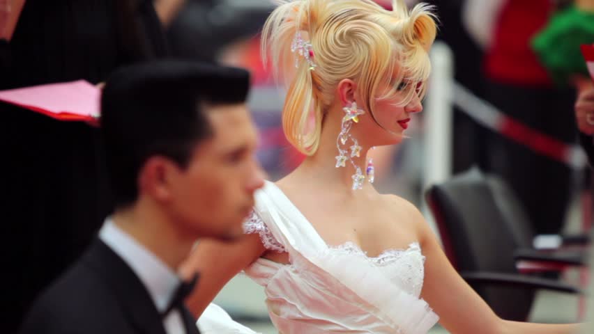 MOSCOW - OCTOBER 2: Jury check man and woman hairstyle at XVII International Festival World of Beauty 2010 in exhibition complex Gostiny Dvor, on October 2, 2010 in Moscow, Russia.