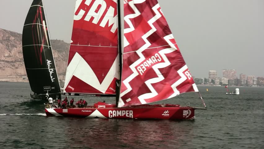 ALICANTE, SPAIN - OCTOBER 7: Camper and Abu Dhabi Team, two of the six teams participating in the race around the world "Volvo Ocean Race 2011-2012" begin their preparation in the first race on Oct 7, 2011 in Alicante Spain. 