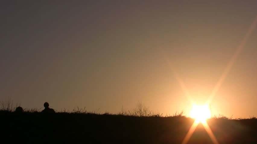 walking family sunset