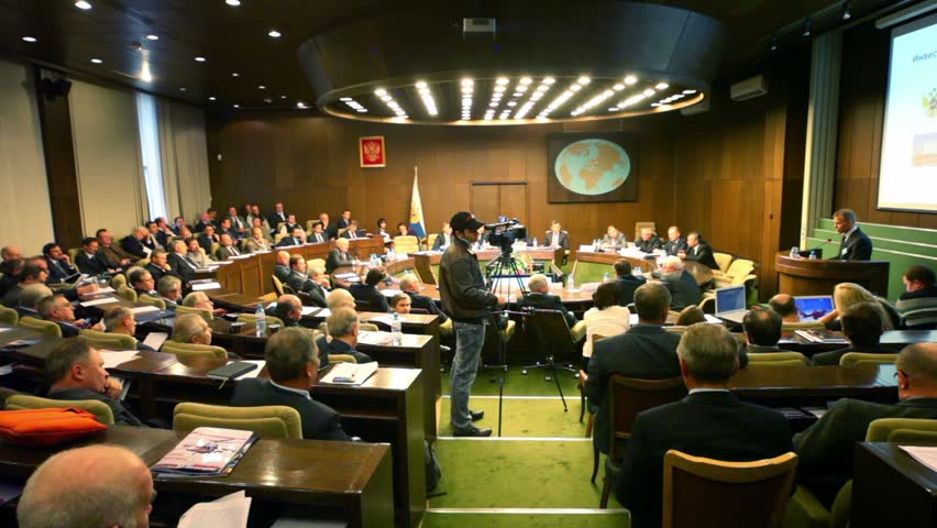 MOSCOW - NOVEMBER 17: Man speaks at podium during Helicopter Forum on November 17, 2010 in Moscow, Russia.Theme of forum was "Modernization and Innovation in helicopter industry." 