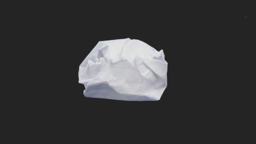 A crumpled piece of paper unfolds