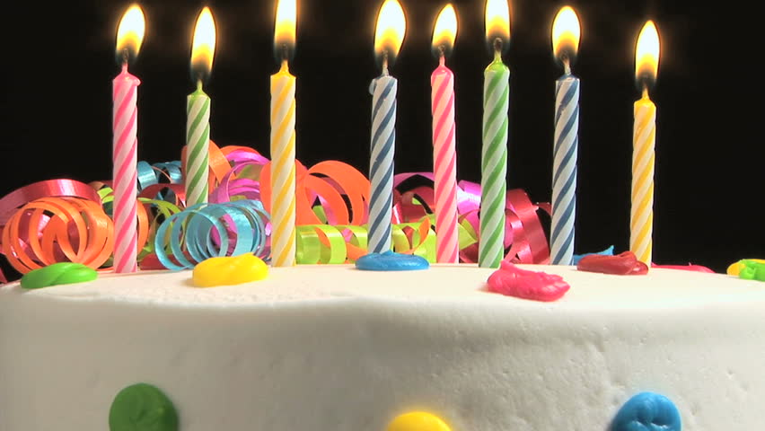 Candles on a Birthday cake burning down