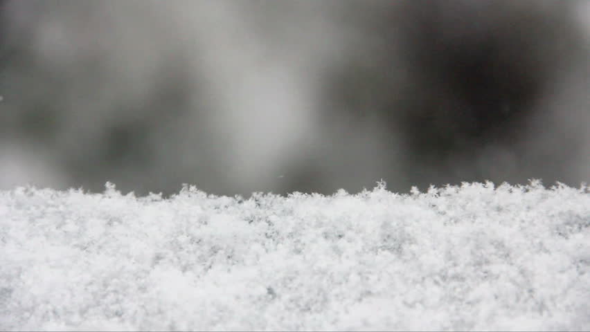 Snow. Falling snowflakes with selective focus. Winter design concept.