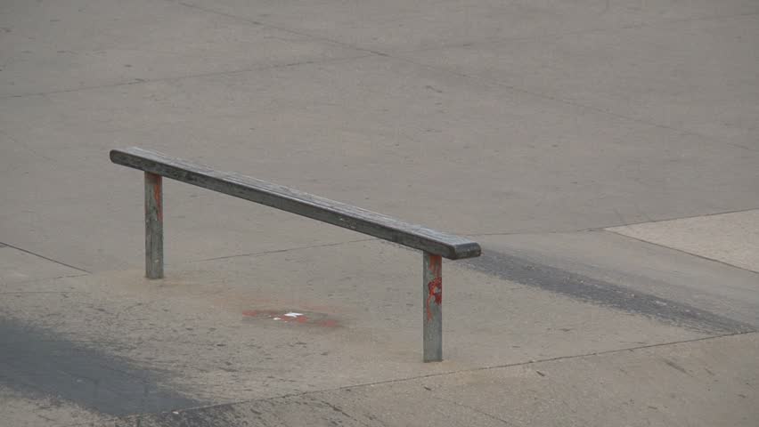 A skater jumps with his skate board