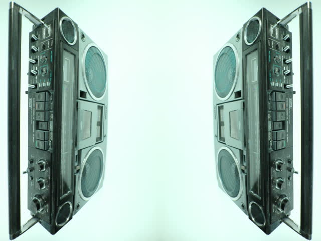 ghetto blaster spits out cassette tape