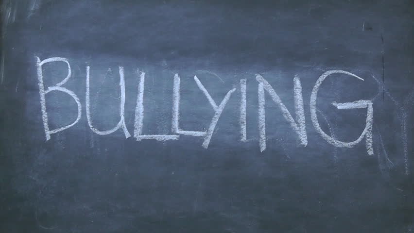 Erase bullying word from a chalkboard