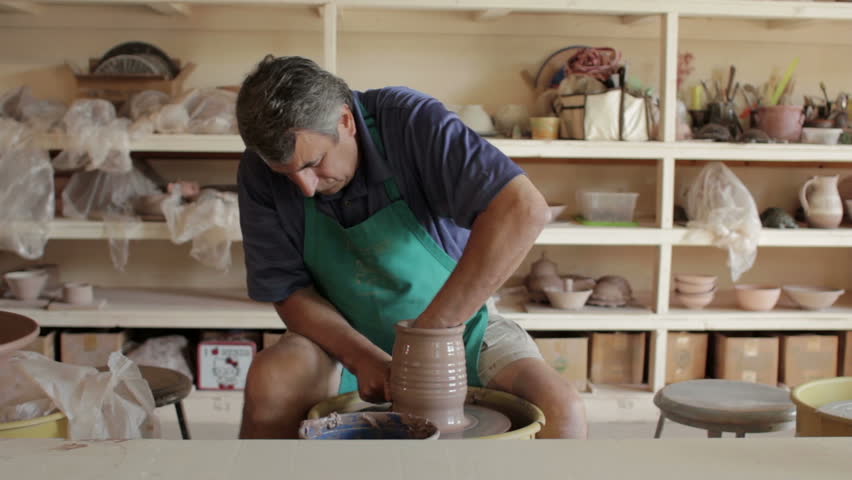 Potter working on the potter's wheel