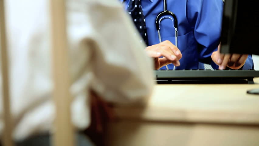 Senior Medical Consultant Meeting with Patient
