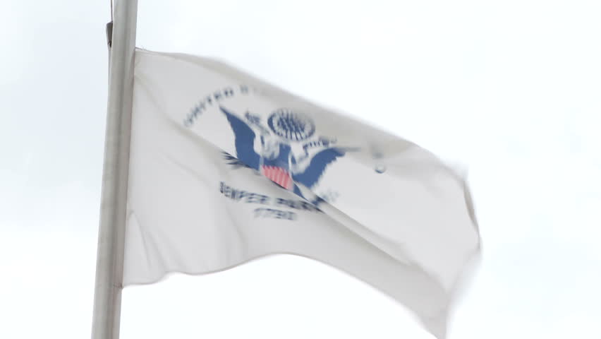 United States Coast Guard flag blowing in wind. True 1080p