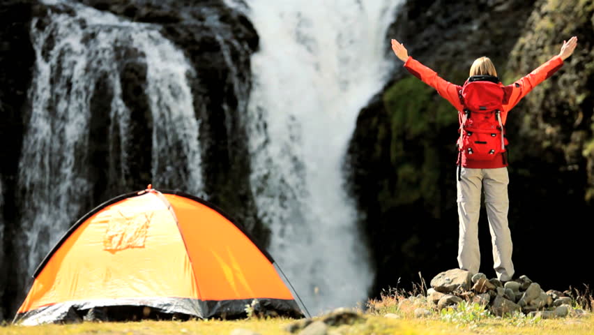 Female Hiker Celebrating Expedition Success