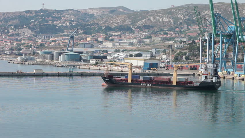 MARSEILLE, FRANCE MAY 23: Cargo ship departing port into Mediterranean Sea May 23 2011 in Marseille France 