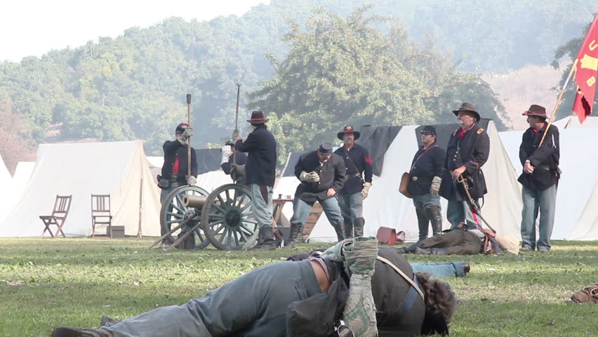 MOORPARK, CA - NOV 13: Union soldiers discharge a Howitzer cannon at "The Blue & The Gray" event on Nov 13, 2011 in Moorpark, CA. Its the largest Civil War reenactment in the West.
