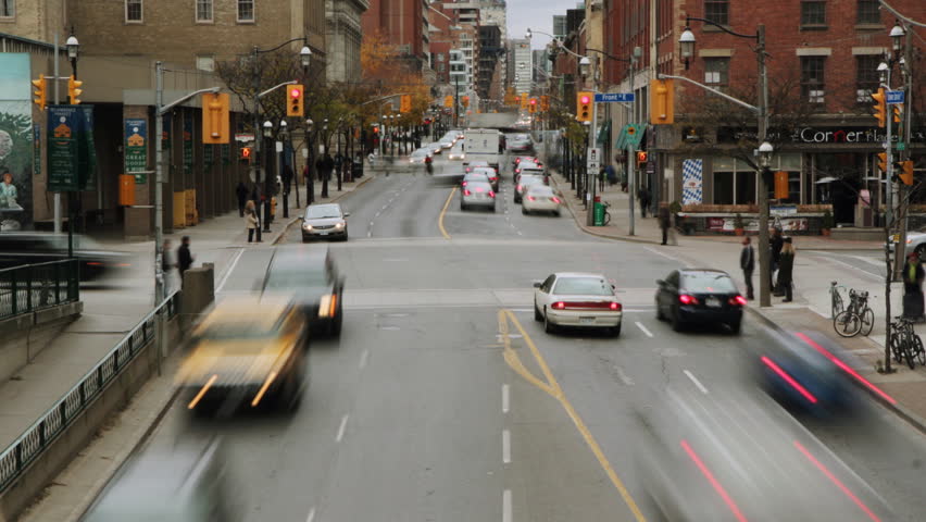 TORONTO, ONTARIO - CIRCA NOVEMBER 2011: (Timelapse View) Vehicle traffic in downtown Toronto circa November 2011 in Toronto, Ontario. Clip is assembled from hi-res stills.  