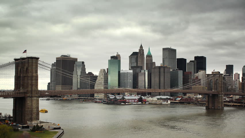 Cloudy timelapse of Brooklyn Bridge, downtown Manhattan, and East River
