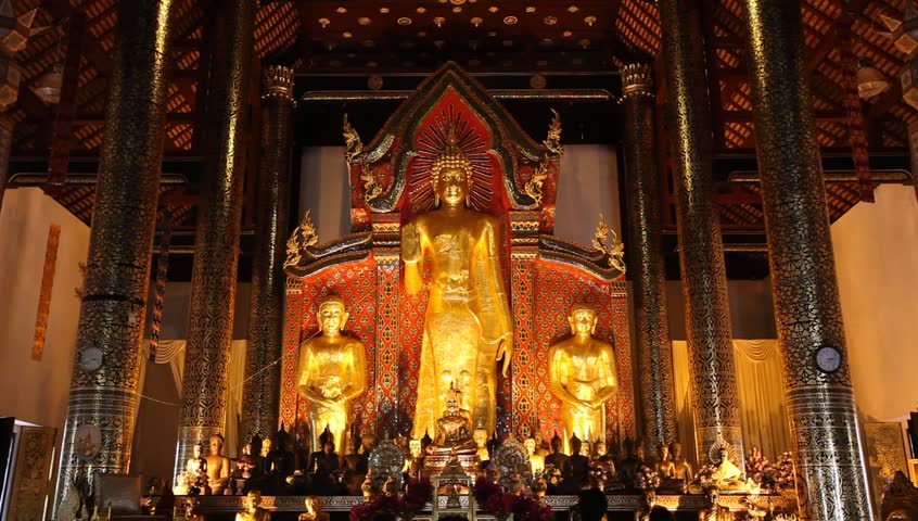 CHIANG MAI, THAILAND - NOVEMBER 25: Thai people worship a Buddhist shrine on November 25, 2011 in Chiang Mai ,Thailand. Buddhism is a majority religion in Thailand.