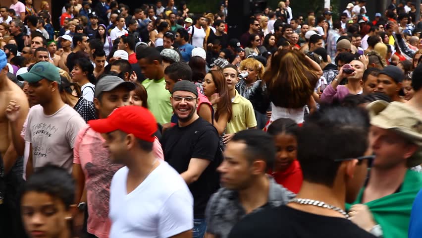 SAN PAULO, BRAZIL - CIRCA JUNE 2011: Crowds celebrate the LGBT Gay Pride Parade on Avenida Paulista circa June 2011 in San Paulo.