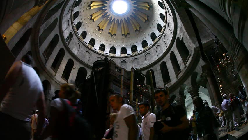 JERUSALEM, ISRAEL - CIRCA OCT 2011: Visitors observe the Rotunda and the Edicule in the Church of the Holy Sepulchre circa October 2011 in Jerusalem.