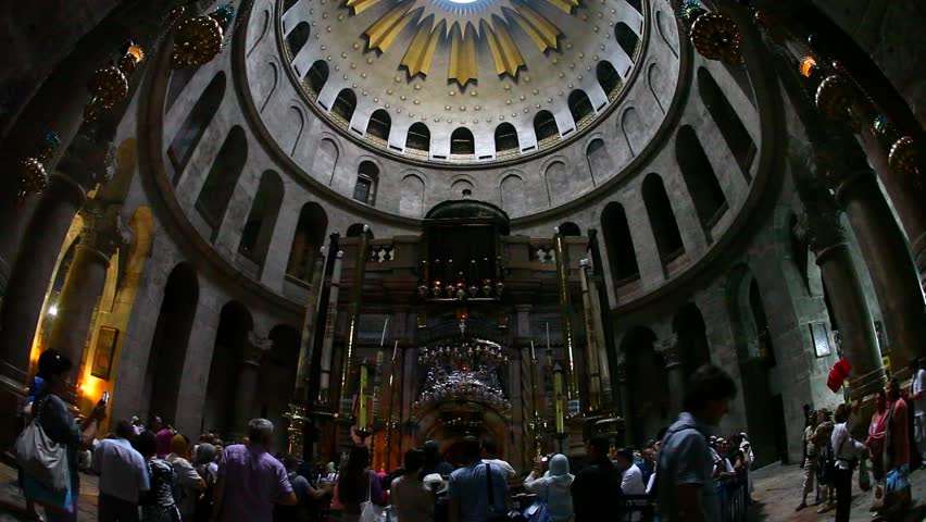 JERUSALEM, ISRAEL - CIRCA OCT 2011: Visitors observe the Rotunda and the Edicule in the Church of the Holy Sepulchre circa October 2011 in Jerusalem.