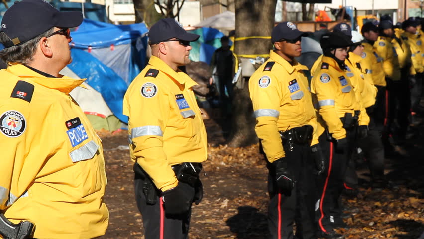 TORONTO, ONTARIO NOV 23th: Police at the Occupy Toronto site on Nov 23rd, 2011, Toronto, Ontario, Canada. The site was closed down on Nov 23rd by police following a superior court judge ruling.
